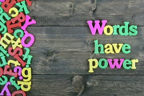 60396326 - words have power word on wooden table